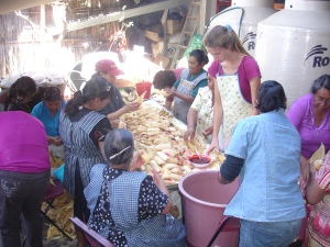 Sisters in Christ helping to prepare a feast for the fiesta